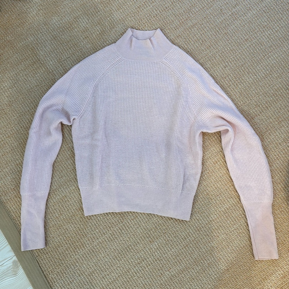 Light pink cashmere waffle turtleneck sweater